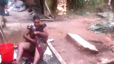 Mature Indian Housewife Open Air Outdoor Shower Filmed By Neighbor