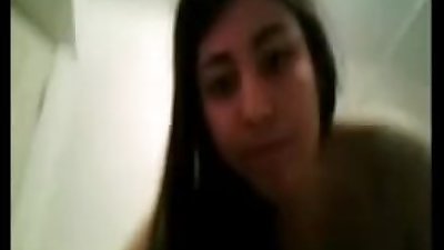 Hot Indian Girl shows off her hot figure in bathroom.mpg