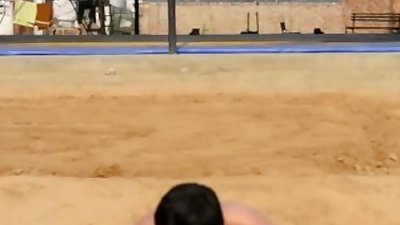 Wrestler in printed langot doing push ups