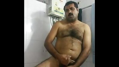 Desi gay video of a hairy uncle jerking off