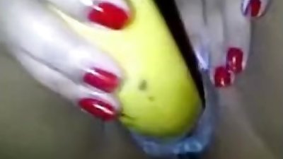 indian_aunty_using_banana_with_condom_in_her_shaved_pussy