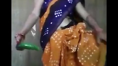 Aunty masturbates in saree with cucumber